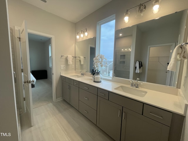 321 Murray Grey Ln, Wake Forest, NC 27587 - bathroom with double vanity, baseboards, and a shower