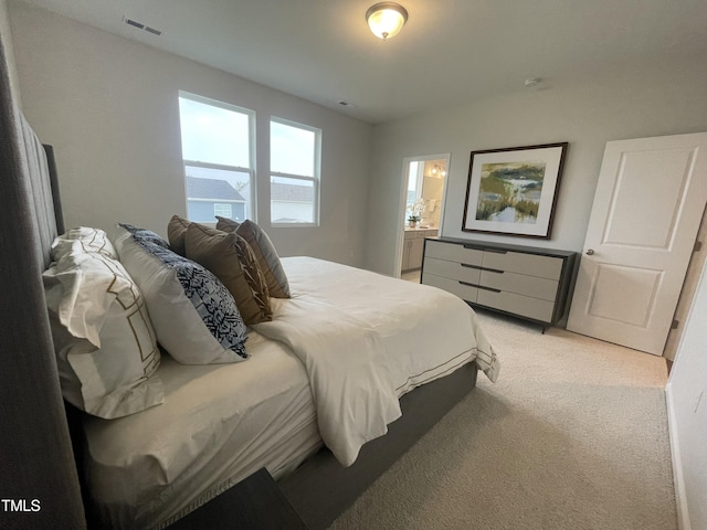 321 Murray Grey Ln, Wake Forest, NC 27587 - bedroom with light carpet and ensuite bathroom