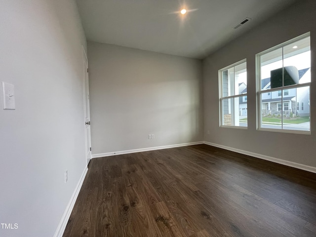 321 Murray Grey Ln, Wake Forest, NC 27587 - empty room featuring dark wood-style flooring and baseboards