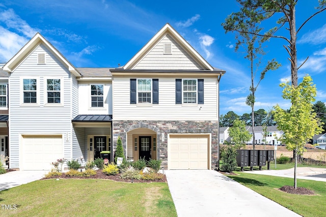 view of front facade featuring a garage and a front lawn