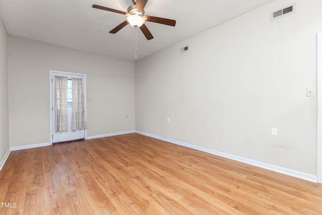 unfurnished room featuring light wood-type flooring and ceiling fan