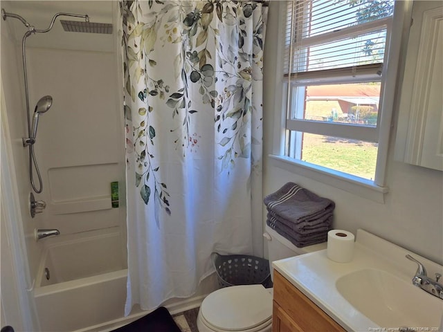 full bathroom with vanity, shower / bath combination with curtain, and toilet