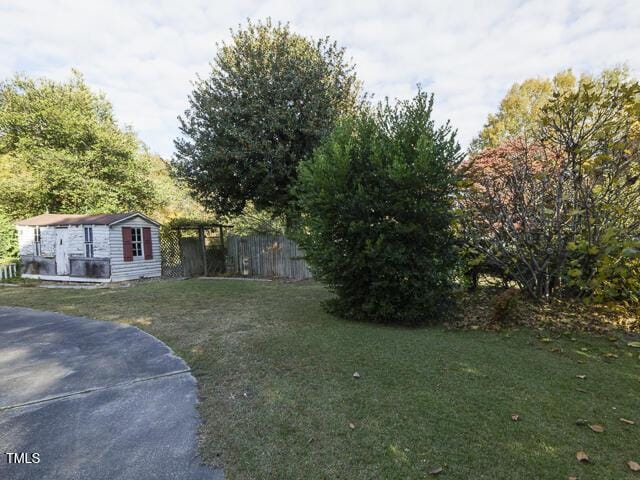 715 E Broad St, Fuquay Varina, NC 27526 - view of yard featuring an outbuilding