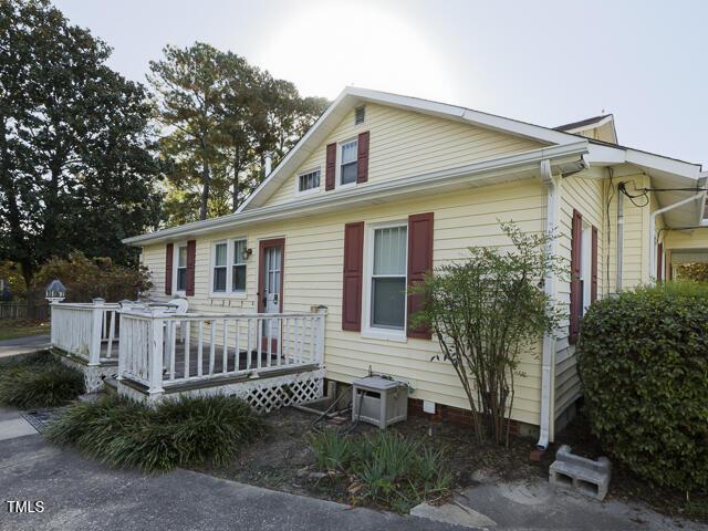 715 E Broad St, Fuquay Varina, NC 27526 - bungalow-style house featuring a deck