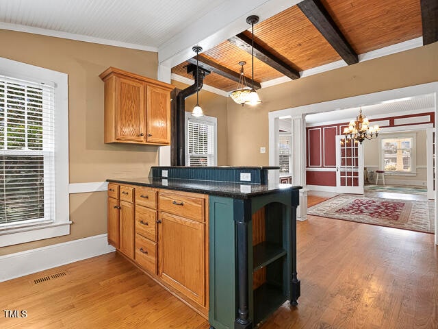 kitchen featuring pendant lighting, kitchen peninsula, wooden ceiling, and light hardwood / wood-style floors