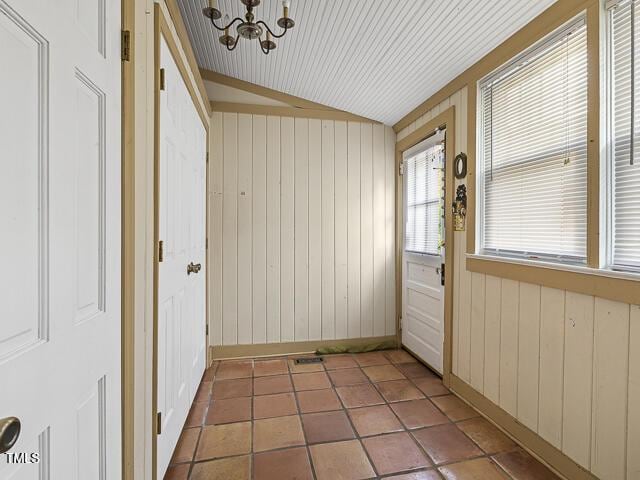 715 E Broad St, Fuquay Varina, NC 27526 - unfurnished sunroom featuring a chandelier