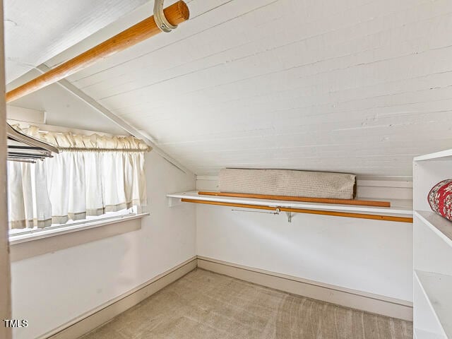 spacious closet featuring lofted ceiling