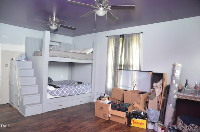 bedroom featuring dark hardwood / wood-style flooring and ceiling fan