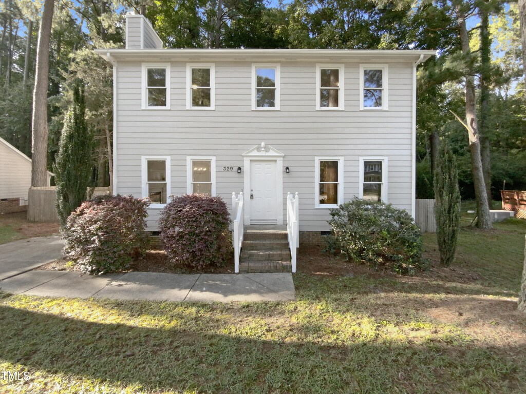 colonial house with a front yard