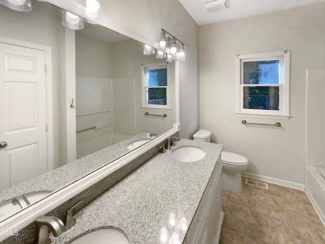 full bathroom featuring shower / bathtub combination, toilet, and vanity