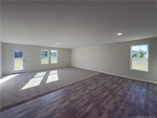 4992 Blue Springs Rd, Red Springs, NC 28377 - unfurnished room featuring recessed lighting, baseboards, and dark wood-style flooring