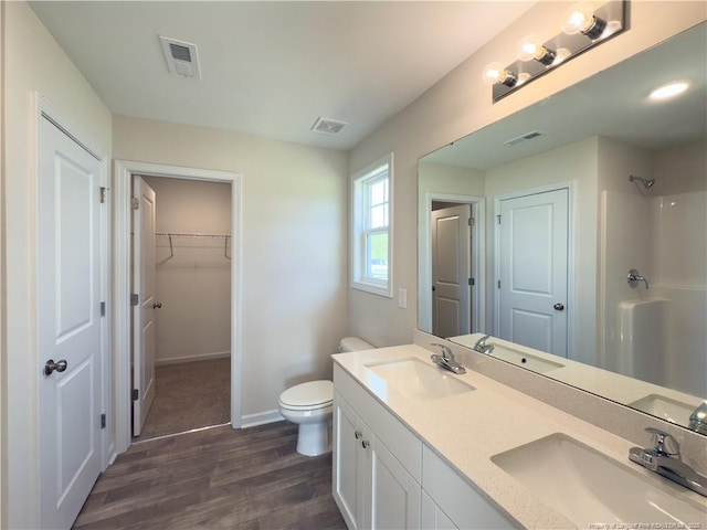 4992 Blue Springs Rd, Red Springs, NC 28377 - bathroom featuring toilet, visible vents, and a sink