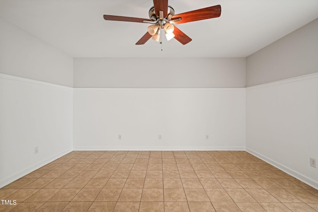 unfurnished room featuring light tile patterned floors and ceiling fan