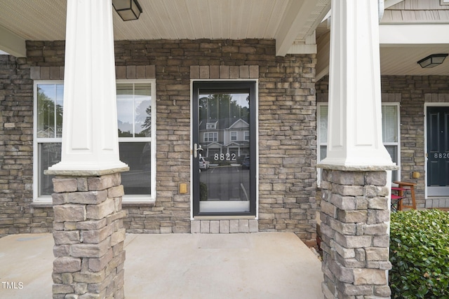 entrance to property with covered porch