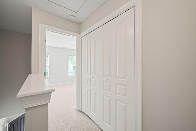 corridor featuring carpet flooring