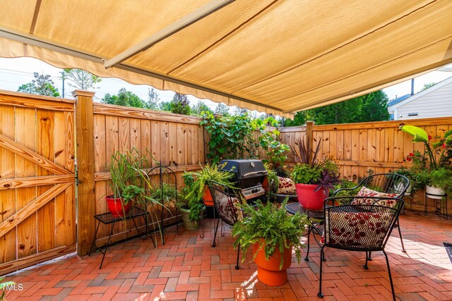 view of patio featuring grilling area