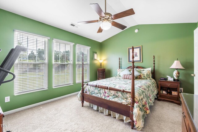 carpeted bedroom with lofted ceiling and ceiling fan