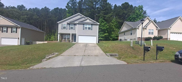 view of front of property featuring a front yard and concrete driveway