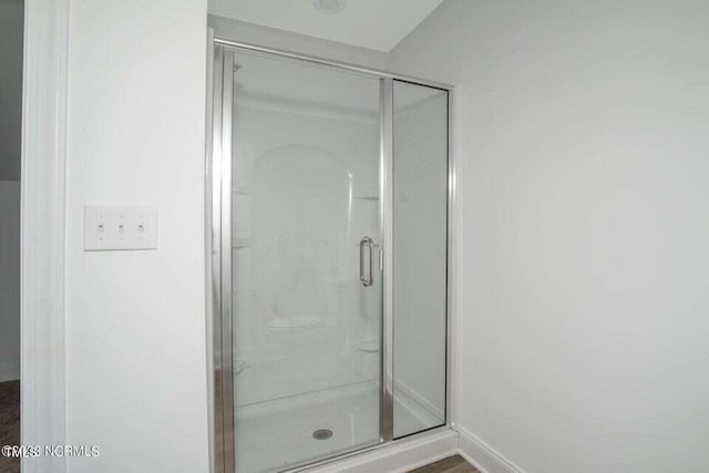 bathroom with an enclosed shower