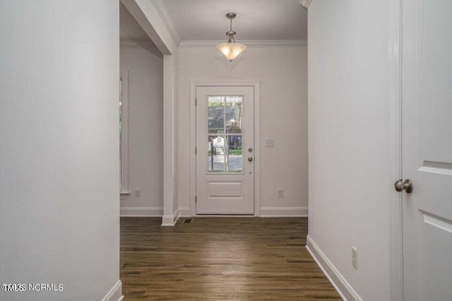 entryway featuring dark wood-type flooring and ornamental molding