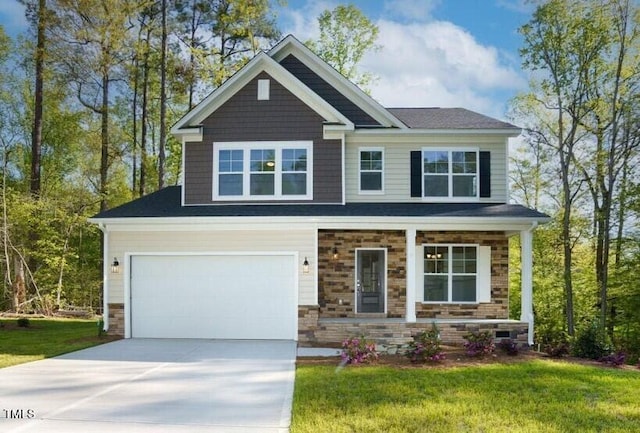 craftsman inspired home featuring a front yard and a porch