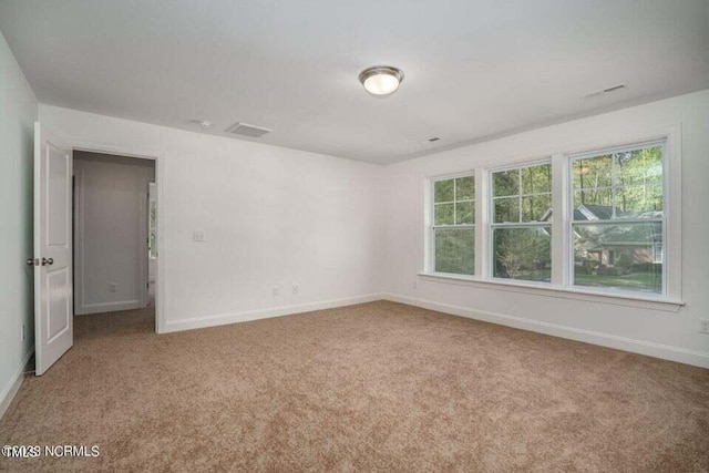 empty room with light carpet