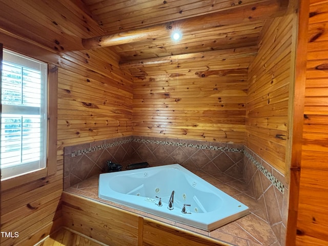 bathroom featuring wood ceiling, wood walls, and a washtub