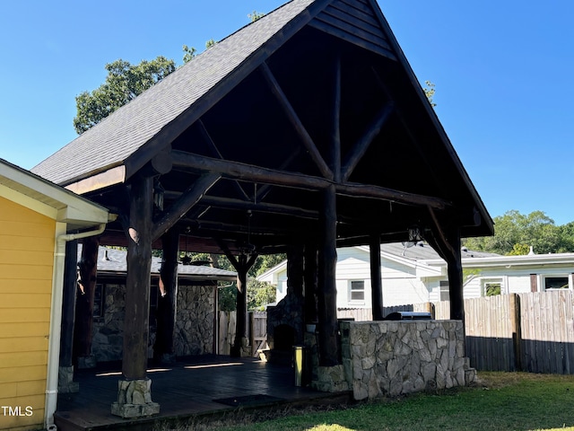 view of home's community with a deck and a gazebo