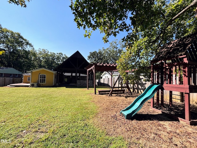 view of jungle gym with a lawn