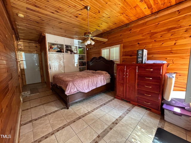 tiled bedroom featuring wood ceiling, wood walls, and ceiling fan