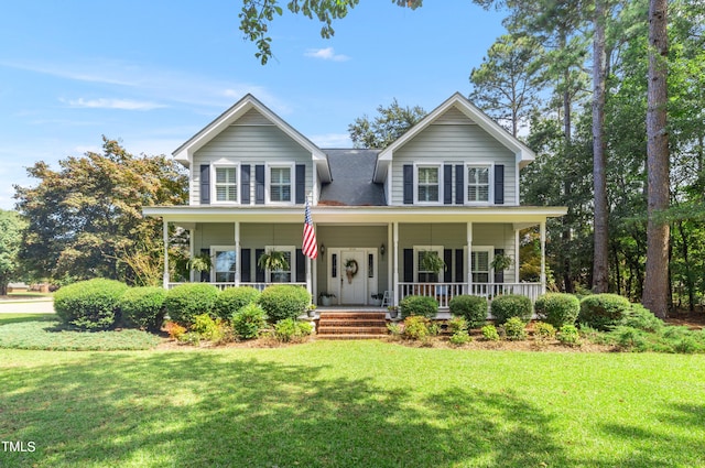 view of front of house with a front lawn and a porch