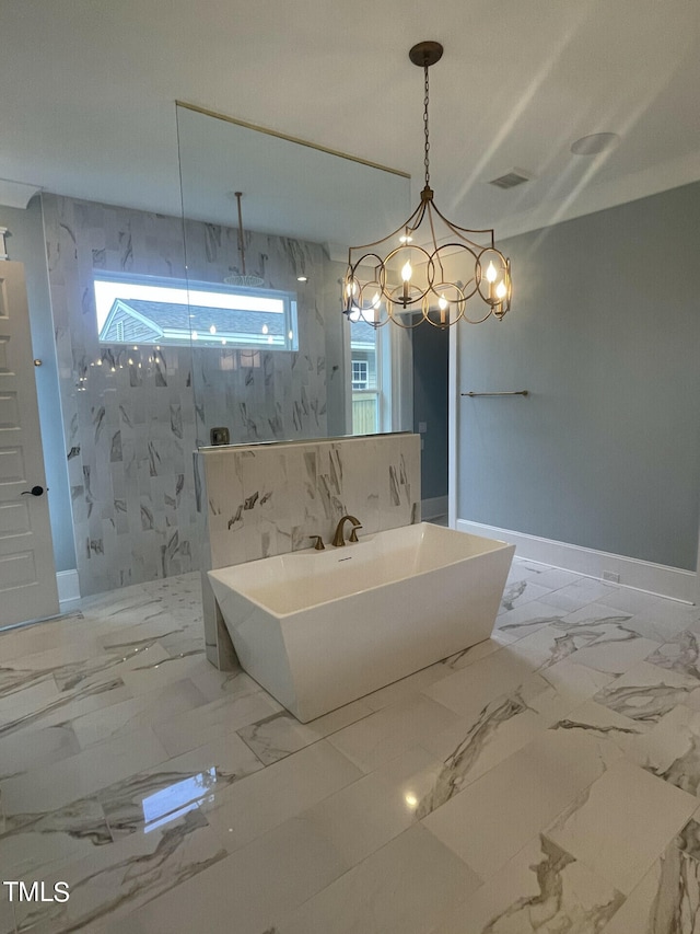 bathroom featuring a wealth of natural light and plus walk in shower