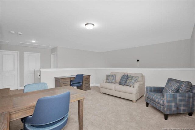 living room featuring light colored carpet