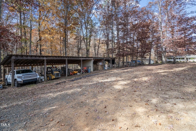 exterior space featuring a carport