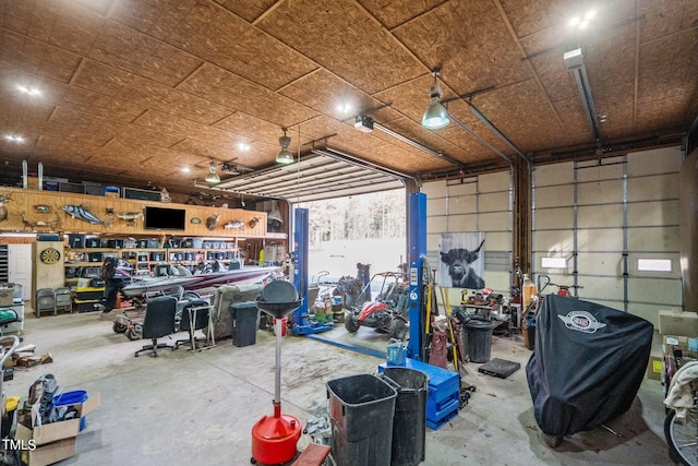 garage with a workshop area