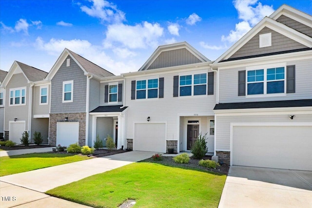 view of front facade featuring a front lawn and a garage