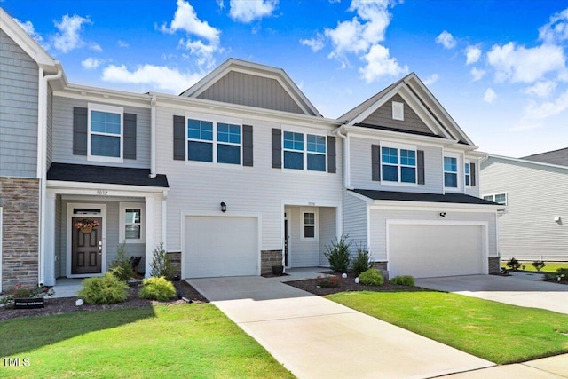 view of front of house featuring a garage and a front yard