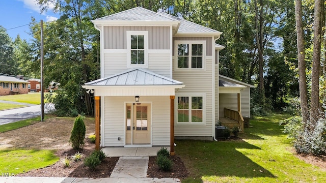 view of front of house with a front lawn