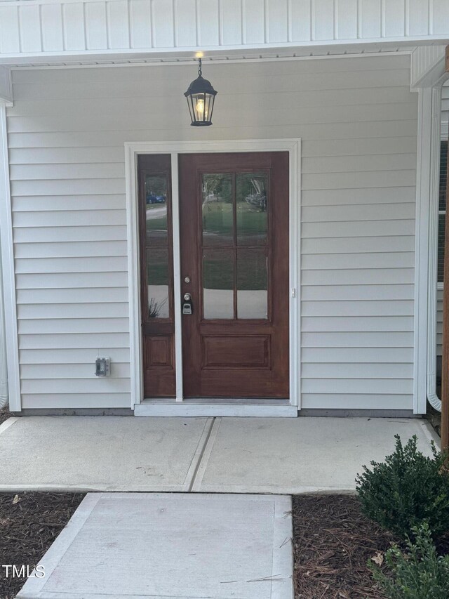 property entrance with a porch