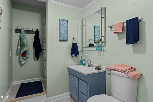 bathroom with vanity, toilet, ornamental molding, and tile patterned floors