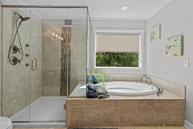 bathroom featuring toilet, shower with separate bathtub, and crown molding