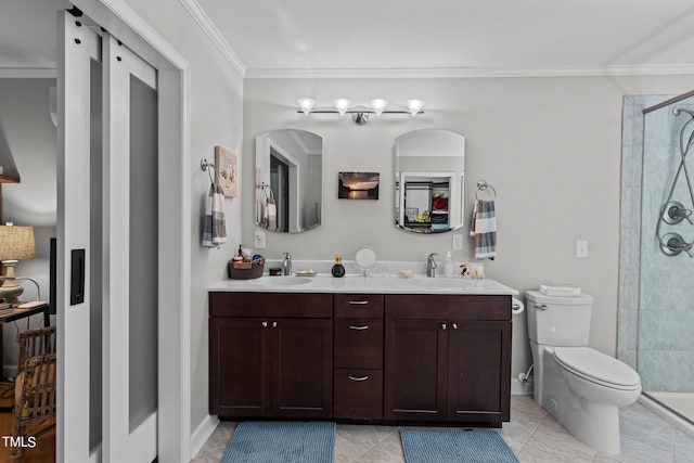 bathroom featuring vanity, an enclosed shower, toilet, ornamental molding, and tile patterned floors