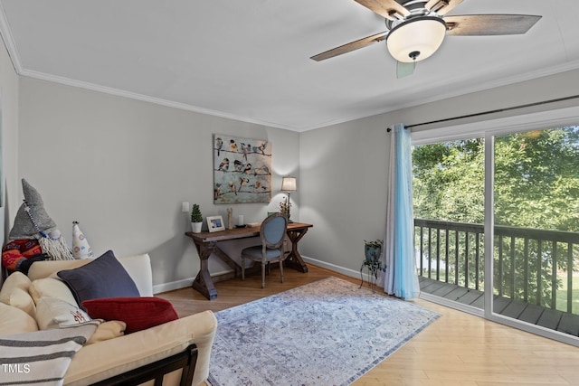 home office featuring ornamental molding, hardwood / wood-style flooring, and ceiling fan