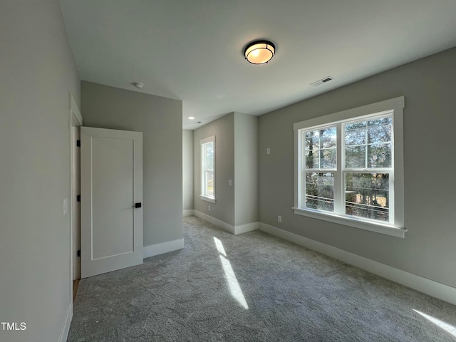 view of carpeted spare room