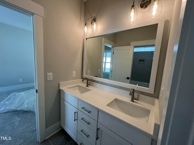 bathroom featuring tile patterned floors and vanity