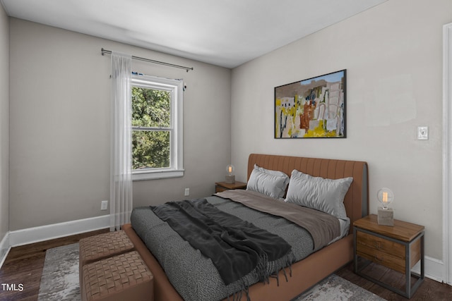 bedroom with wood-type flooring