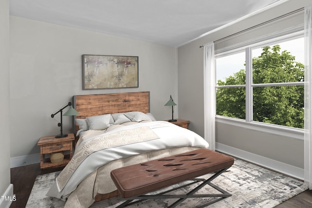 bedroom with dark wood-type flooring