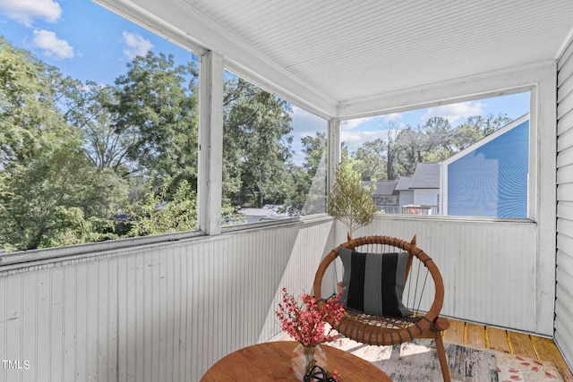 sunroom with plenty of natural light