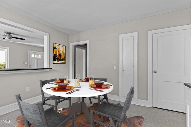 dining area with ceiling fan