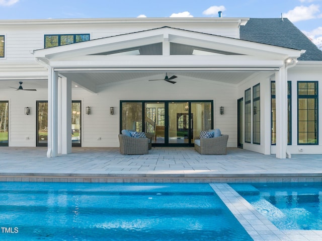 back of house with ceiling fan and a patio area